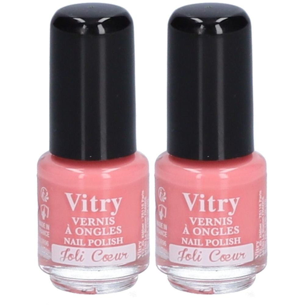 Twee flesjes nagellak met zwarte dop. Opschrift: Vitry, Vernis à Ongles, Nail Polish, Joli Coeur. Roze tint.