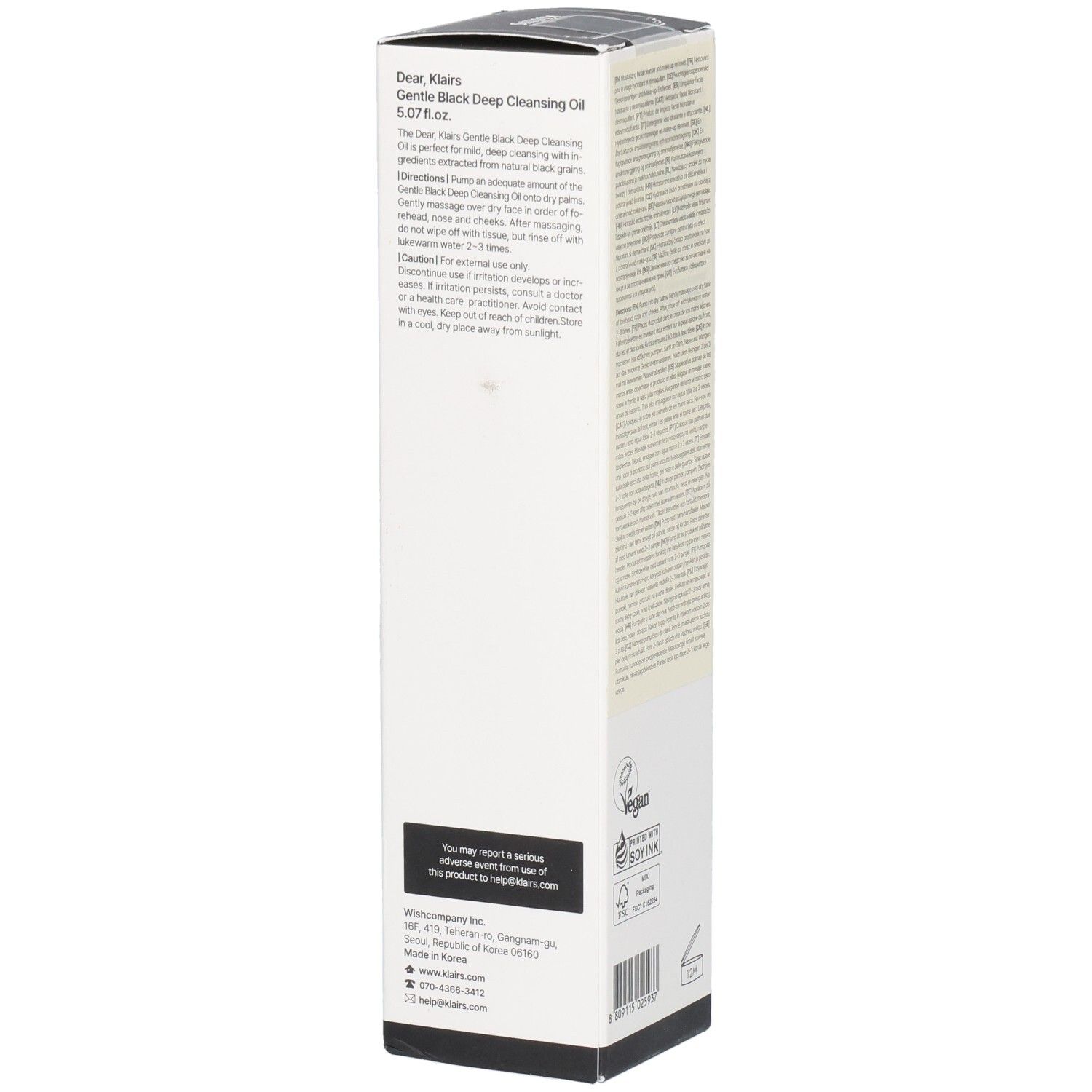 Witte verpakking met tekst. Tekst: Gentle Black Deep Cleansing Oil. Veganistisch logo. Recycling logo. Achterkant.