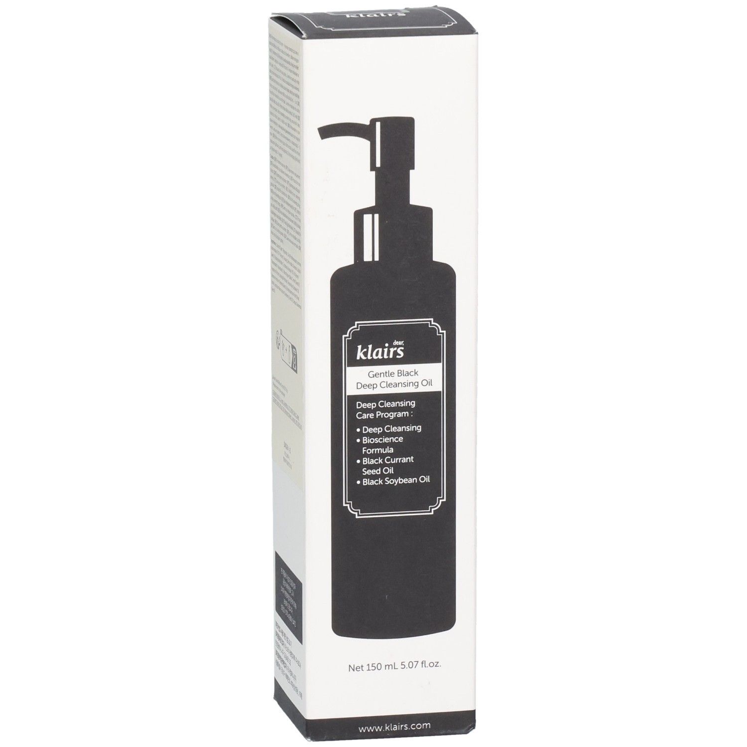 Witte verpakking met zwarte productafbeelding. Tekst: Gentle Black Deep Cleansing Oil. Pomp. Voorkant.