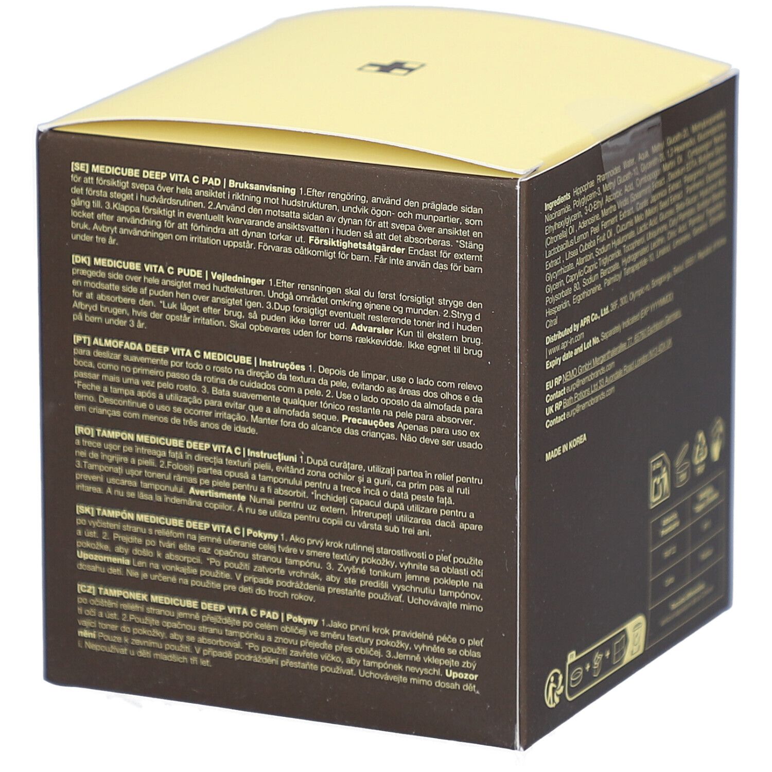 Bruine doos met gele deksel. Opschrift: medicube, DEEP VITA C PAD, Vitamin Water, Vitamin C Derivative, Niacinamide 2%. Gebruiksaanwijzing.