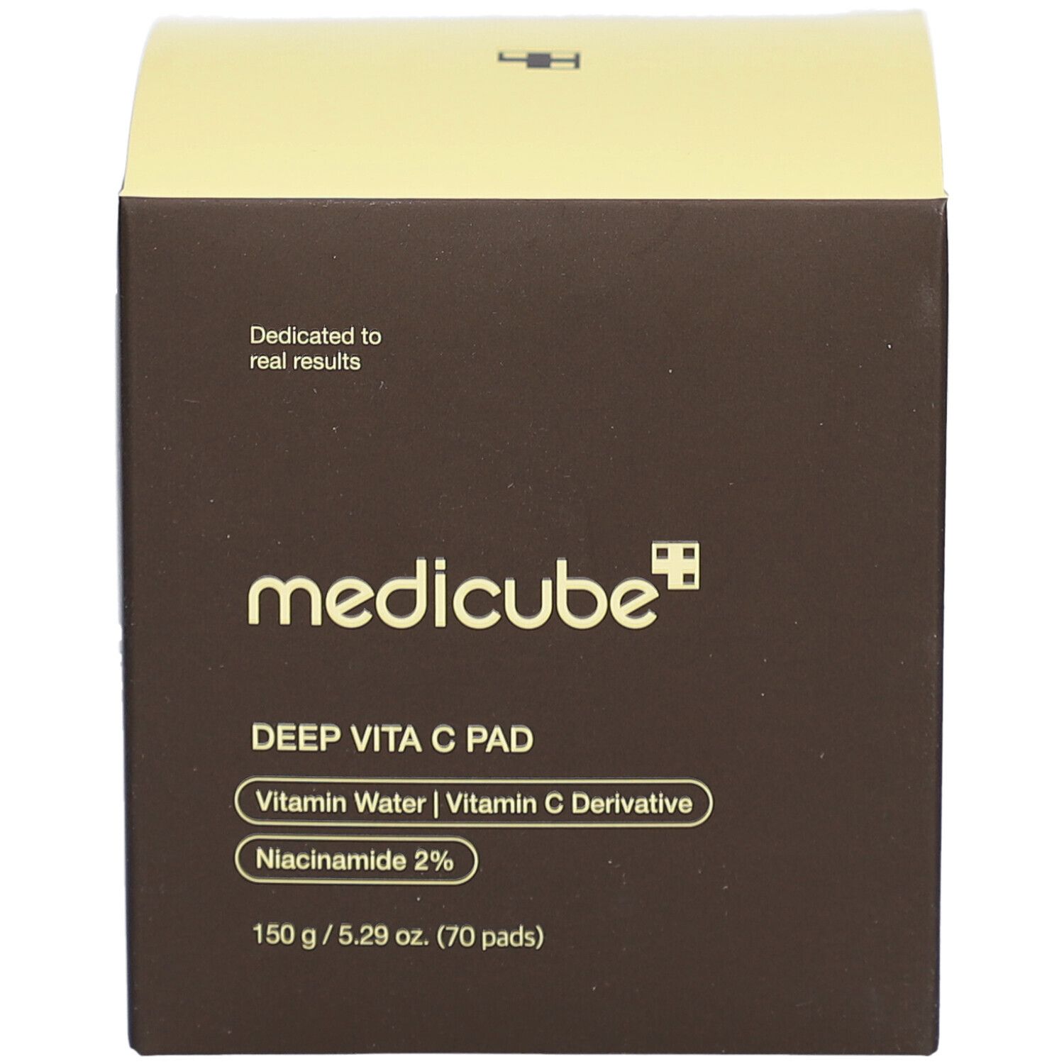 Bruine doos met gele deksel. Opschrift: medicube, DEEP VITA C PAD, Vitamin Water, Vitamin C Derivative, Niacinamide 2%.