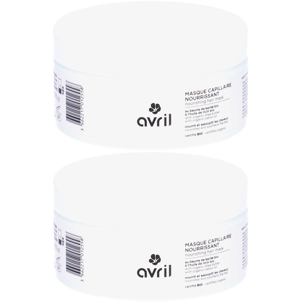 Twee witte potten met deksels. Opschrift: Masque Capillaire Nourrissant. Merk: avril. Tekst: Bio-sheaboter, bio-arganolie.