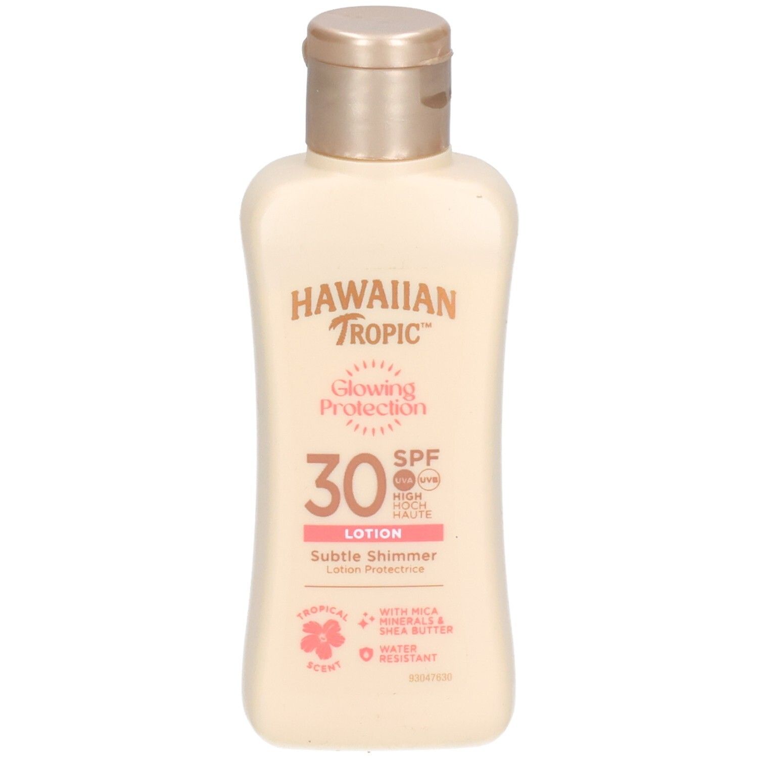 Beige lotionfles met gouden dop. Opschrift: Hawaiian Tropic, Glowing Protection SPF30. Roze etiket met tekst.