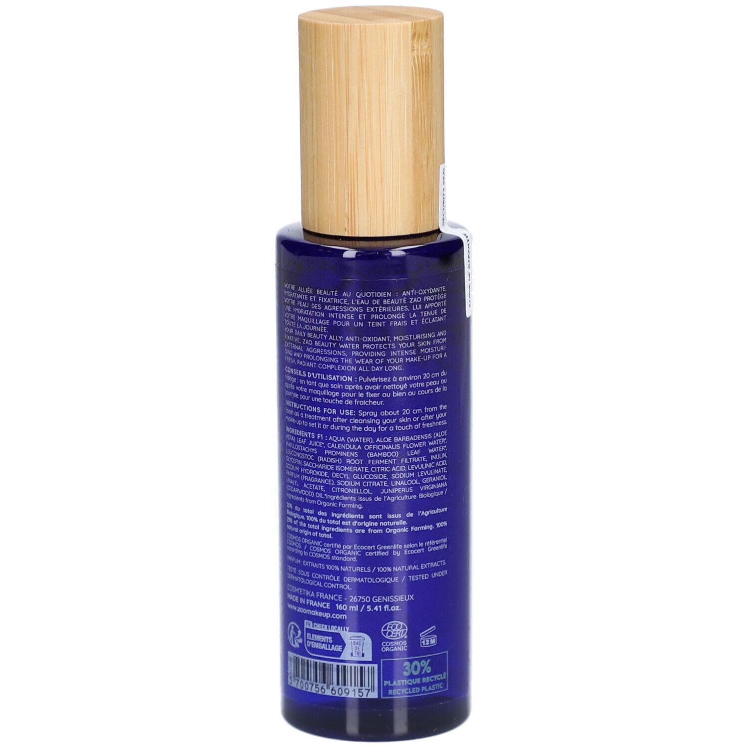 Dos d'un flacon bleu avec bouchon en bois. Texte : ingrédients, mode d'emploi, informations fabricant, certification bio.