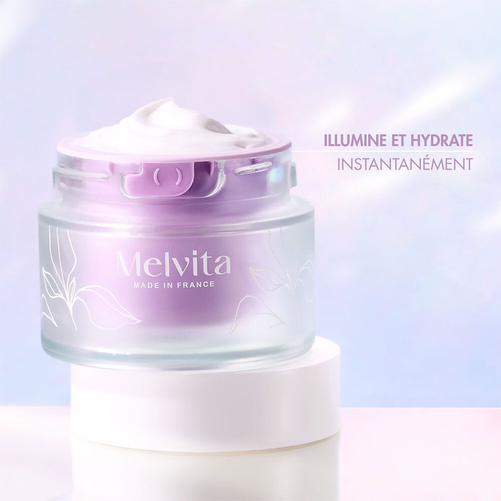 Crèmepot op een andere. Tekst: Illumine et hydrate instantanément. Melvita.