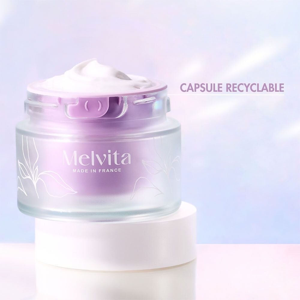Crèmepot met deksel. Tekst: Capsule recyclable. Melvita.