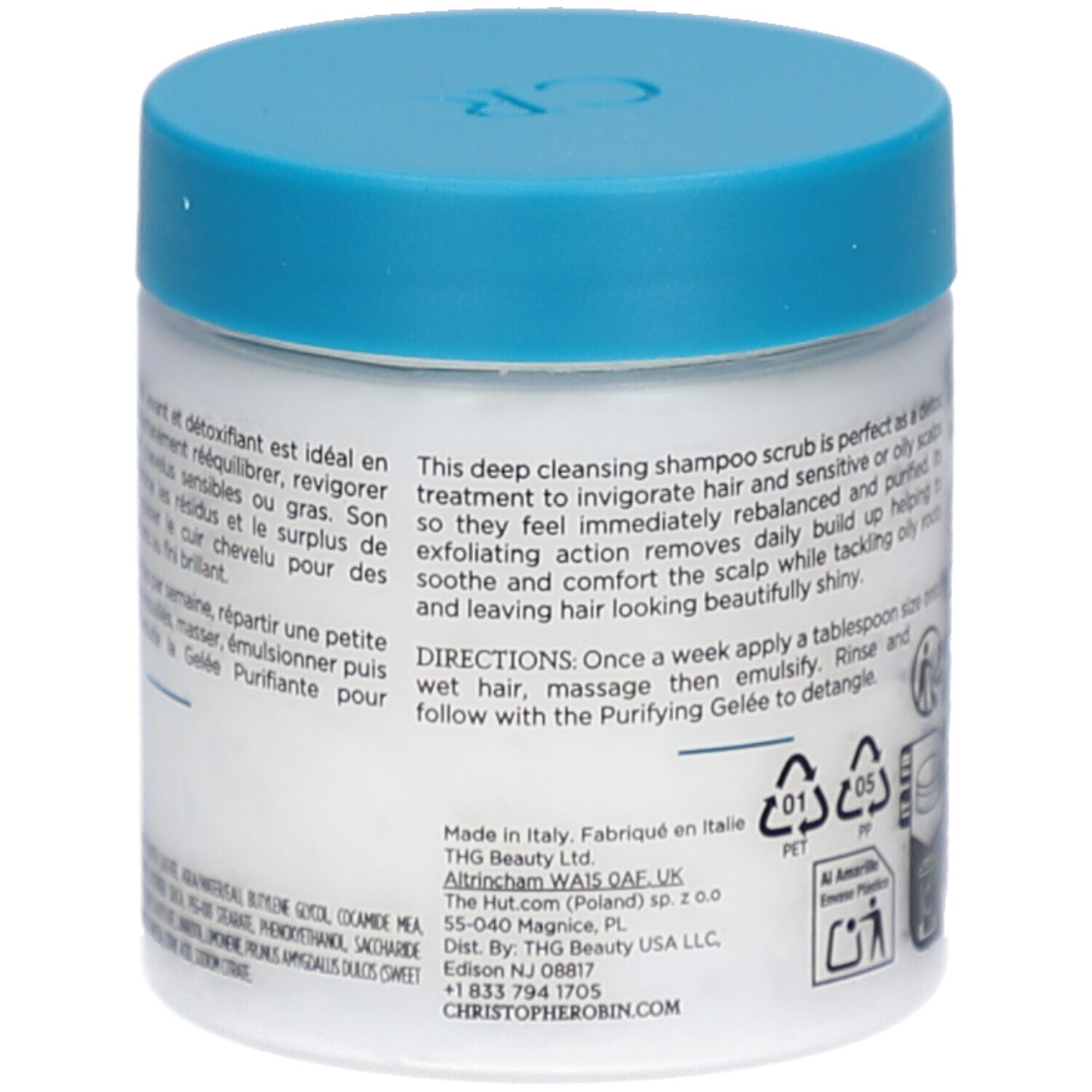 Achterkant van de witte pot met blauwe deksel. Tekst: Gemaakt in Italië. Adres van de fabrikant. Gebruiksaanwijzing.