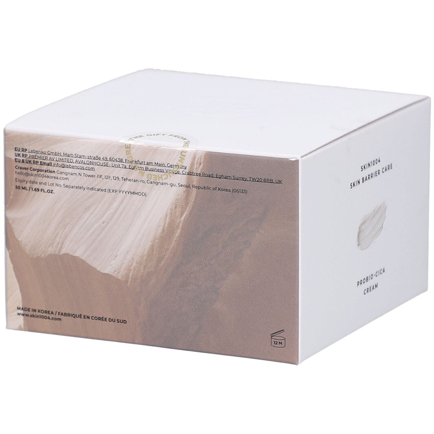 Dos de la boîte blanche. Texte: SKIN1004, informations produit, ingrédients, origine.