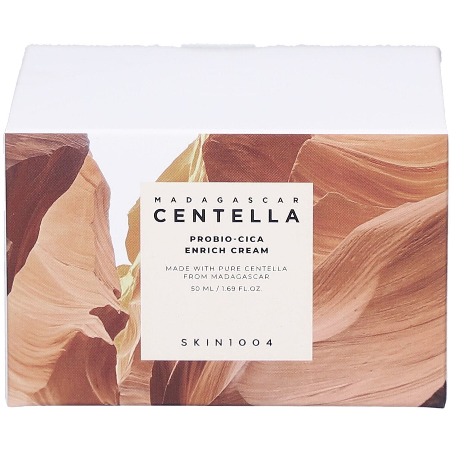 Boîte avec informations produit. Texte: MADAGASCAR CENTELLA, PROBIO-CICA ENRICH CREAM, SKIN1004.