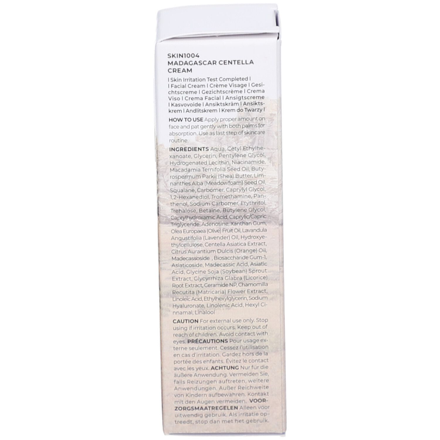 Achterkant van de verpakking. Tekst: SKIN1004 MADAGASCAR CENTELLA, ingrediënten, gebruik, 30 ml.