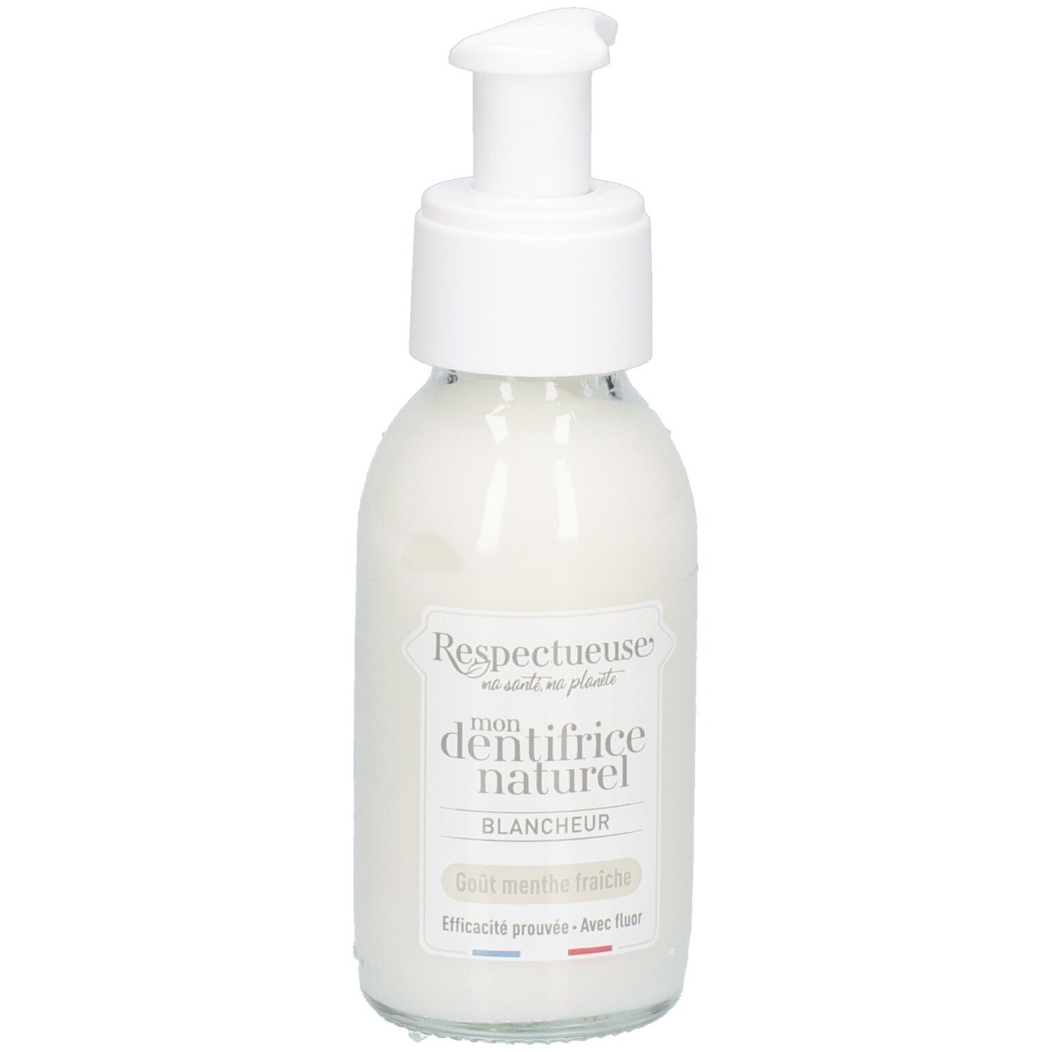 Witte glazen fles met pomp. Opschrift: "Respectueuse mon dentifrice naturel blancheur". Smaak: frisse munt.