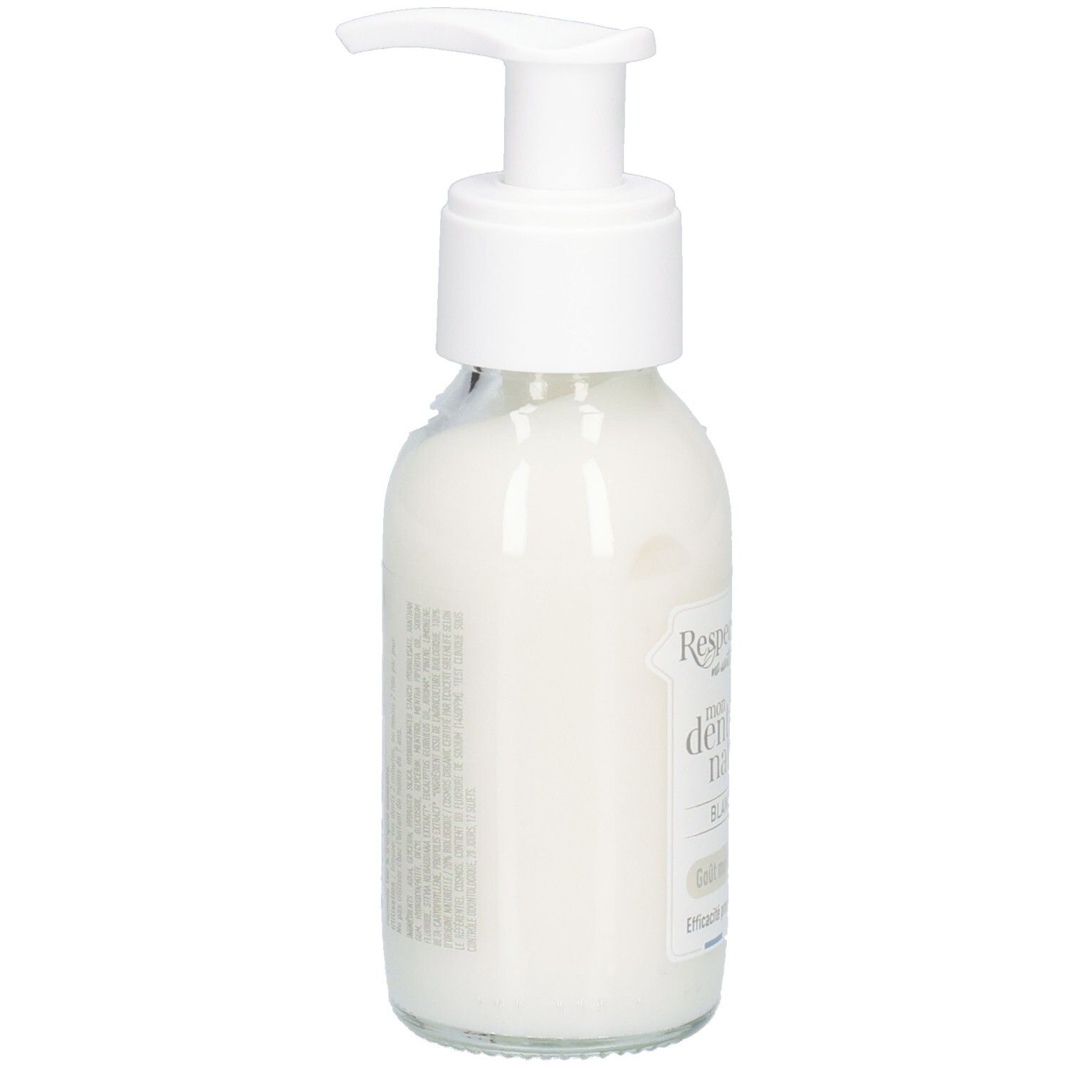 Glazen fles met witte inhoud en pomp. Opschriften en tekst op de zijkant. Etiket met informatie.