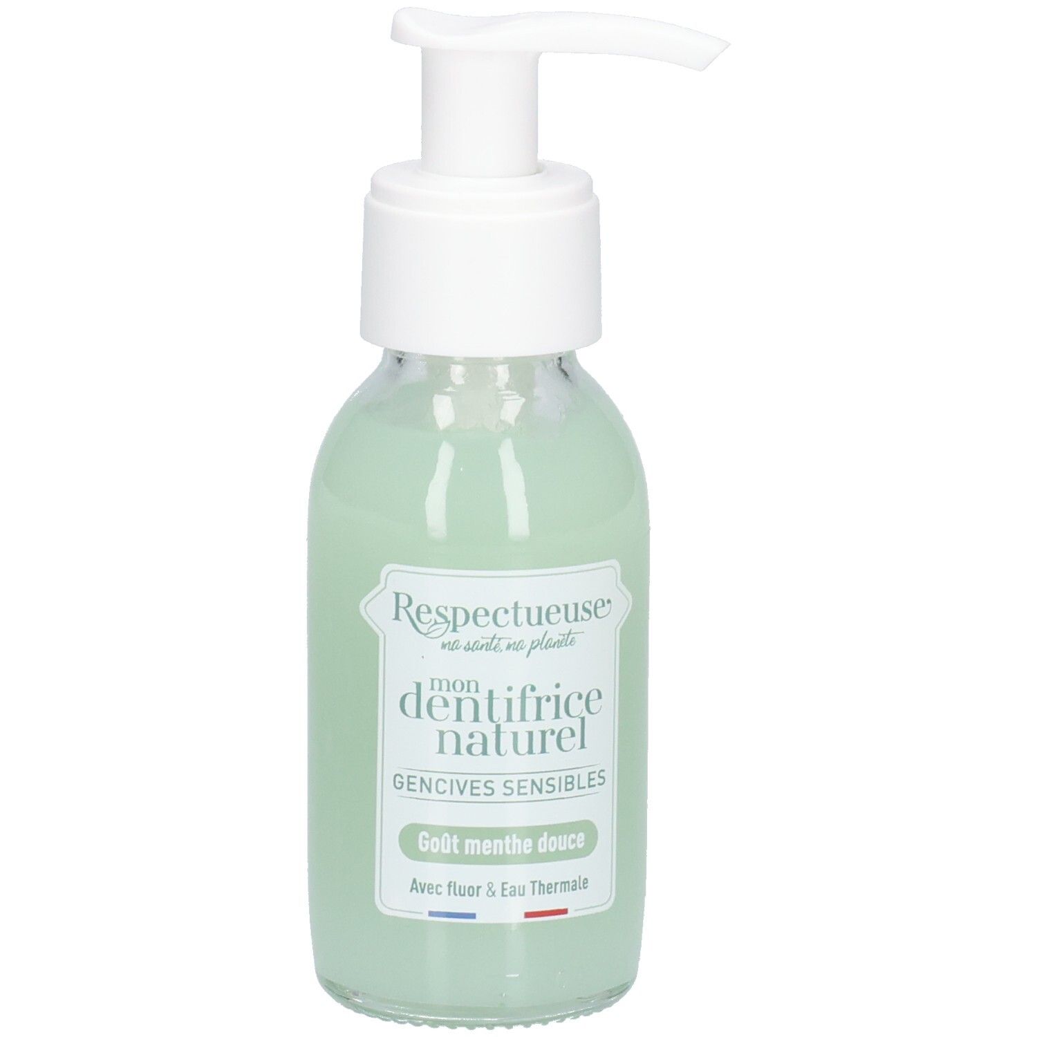 Glazen fles met witte pomp, groene vloeistof. Label: "Respectueuse", "dentifrice naturel", "Gencives sensibles". Franse vlag.