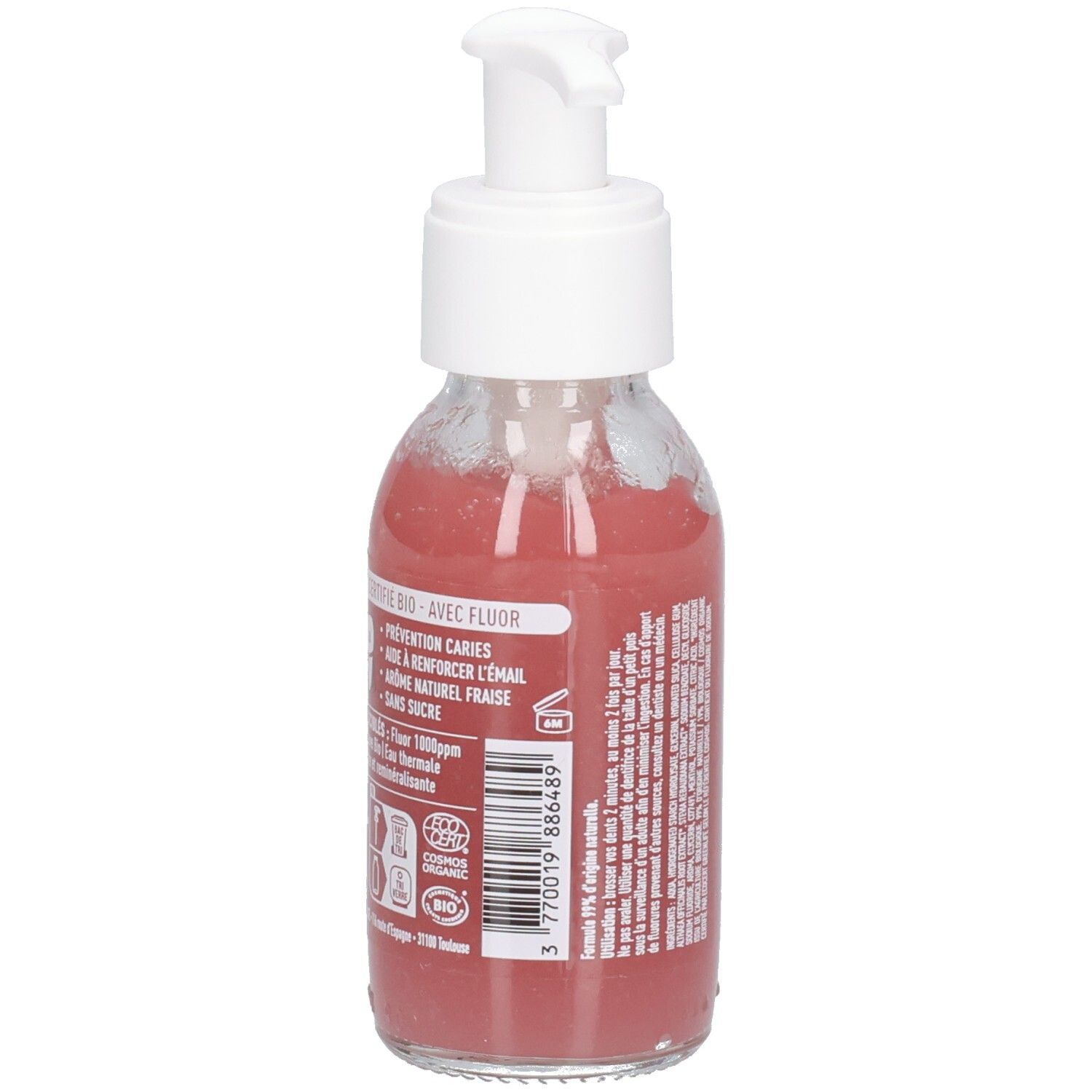 Glazen fles met roze vloeistof en witte pomp. Opschrift: "BIO", tekst en logo's.