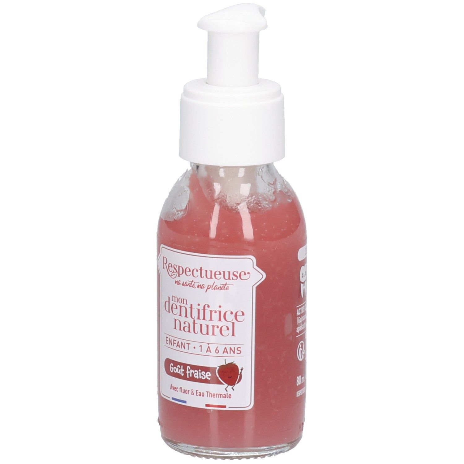 Roze vloeistof in glazen fles met witte pomp. Opschrift: "Respectueuse", "dentifrice naturel", "Goût fraise".