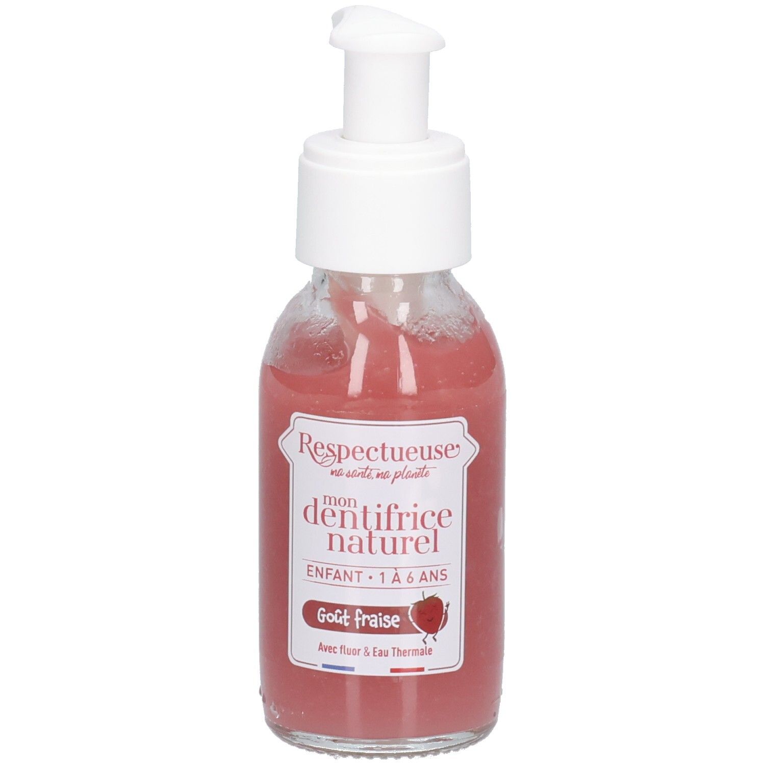 Roze vloeistof in glazen fles met witte pomp. Opschrift: "Respectueuse", "dentifrice naturel", "Goût fraise".