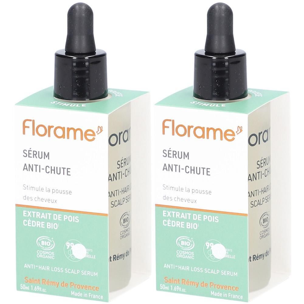 Twee flessen Florame Sérum Anti-Chute met druppelaar en verpakking. Opschrift: Sérum Anti-Chute, Extrait de pois cèdre bio.
