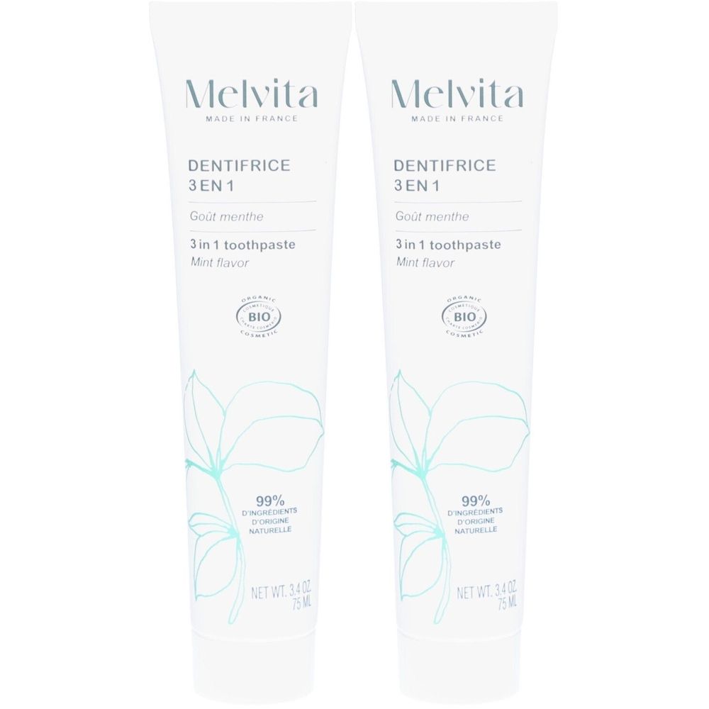 Twee witte tubes tandpasta. Opschriften: Melvita, Dentifrice 3 en 1, mintsmaak, 99% ingrediënten van natuurlijke oorsprong, Bio.