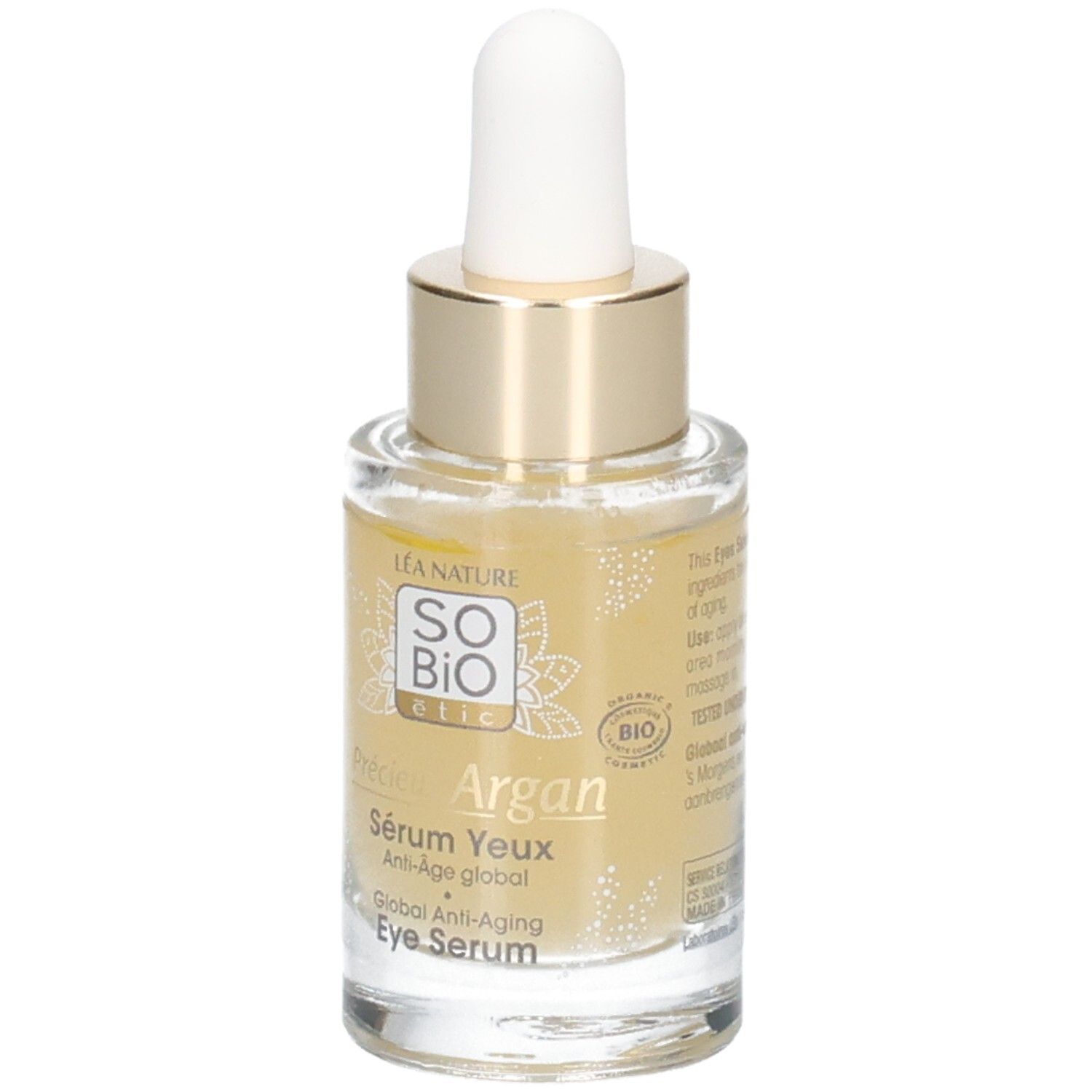 Glazen fles met gouden dop en pipet. Opschrift: Sérum Yeux Anti-Âge global. Bio-certificering.