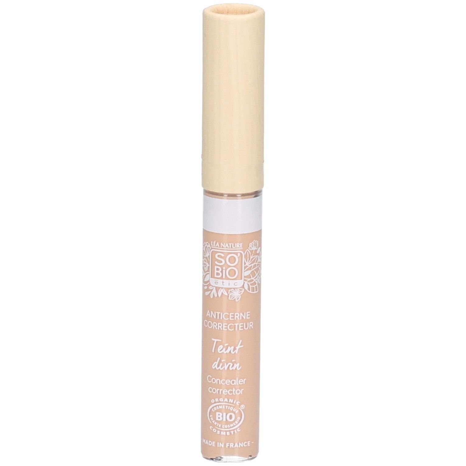 Correcteur beige avec bouchon clair. Inscriptions: SO BIO, Anticerne Correcteur, Teint divin, Concealer corrector.