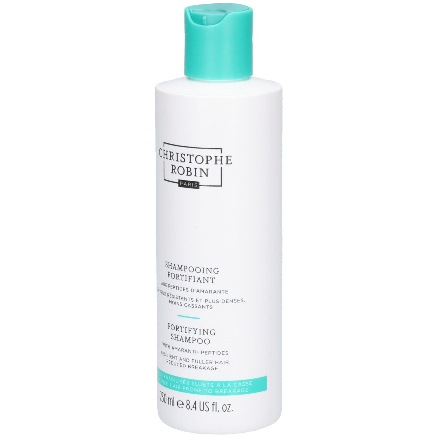 Witte fles met turquoise dop. Opschrift: Christophe Robin, Shampooing Fortifiant, Fortifying Shampoo.