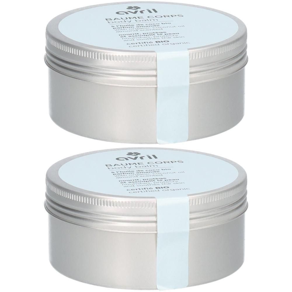 Twee zilverkleurige potten met lichtblauw etiket. Opschrift: AVRIL, Baume Corps, Certifié Bio. Productverpakking.
