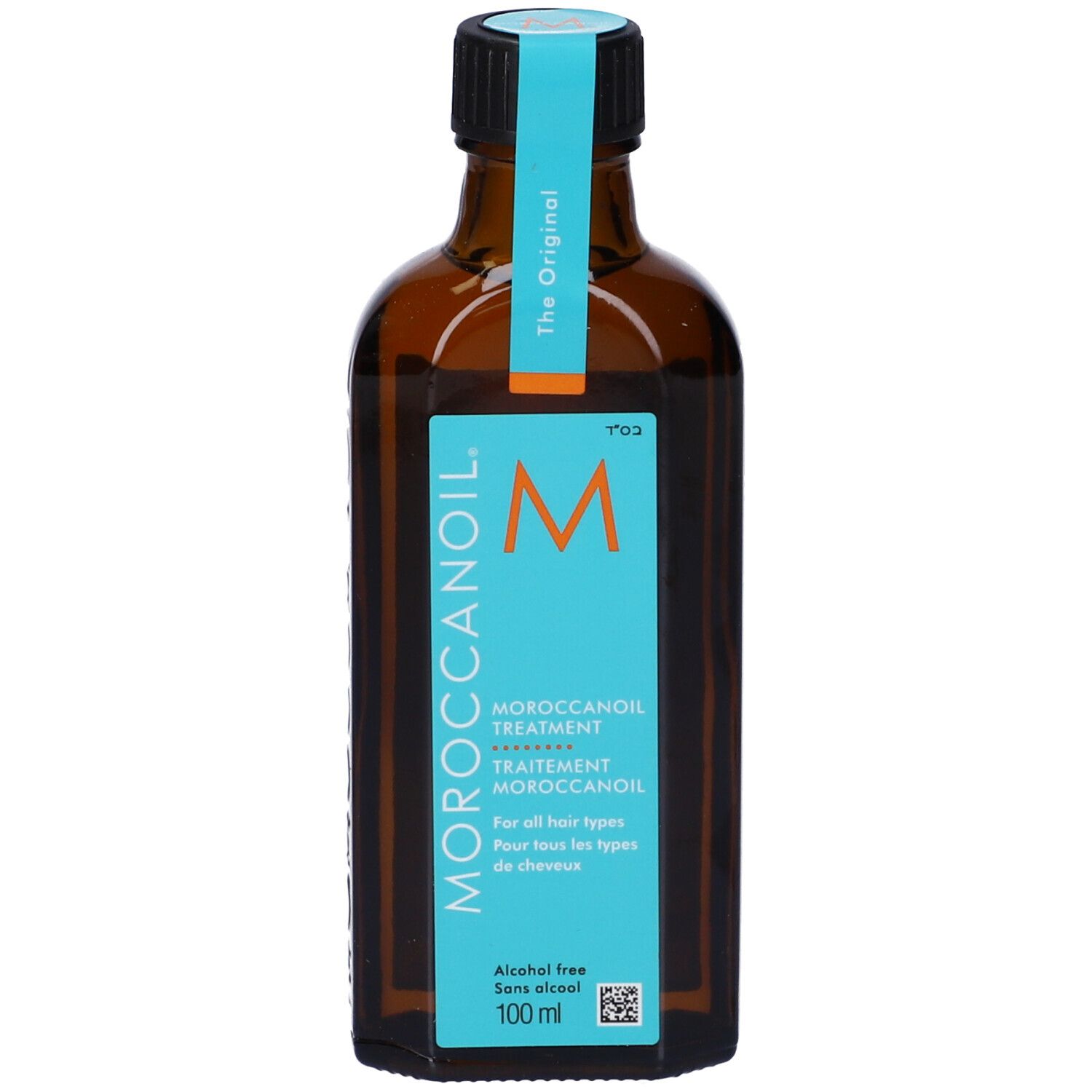 Moroccanoil Treatment verpakking, turquoise, met logo en productinformatie.