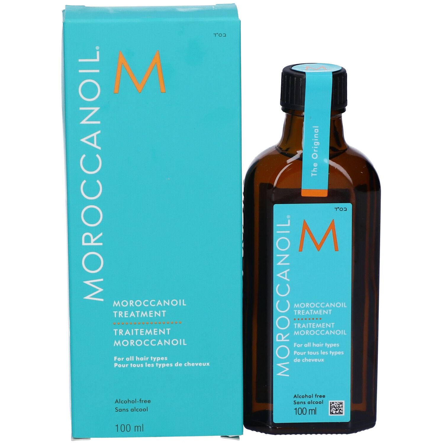 Moroccanoil Treatment flesje en verpakking, turquoise, naast elkaar.