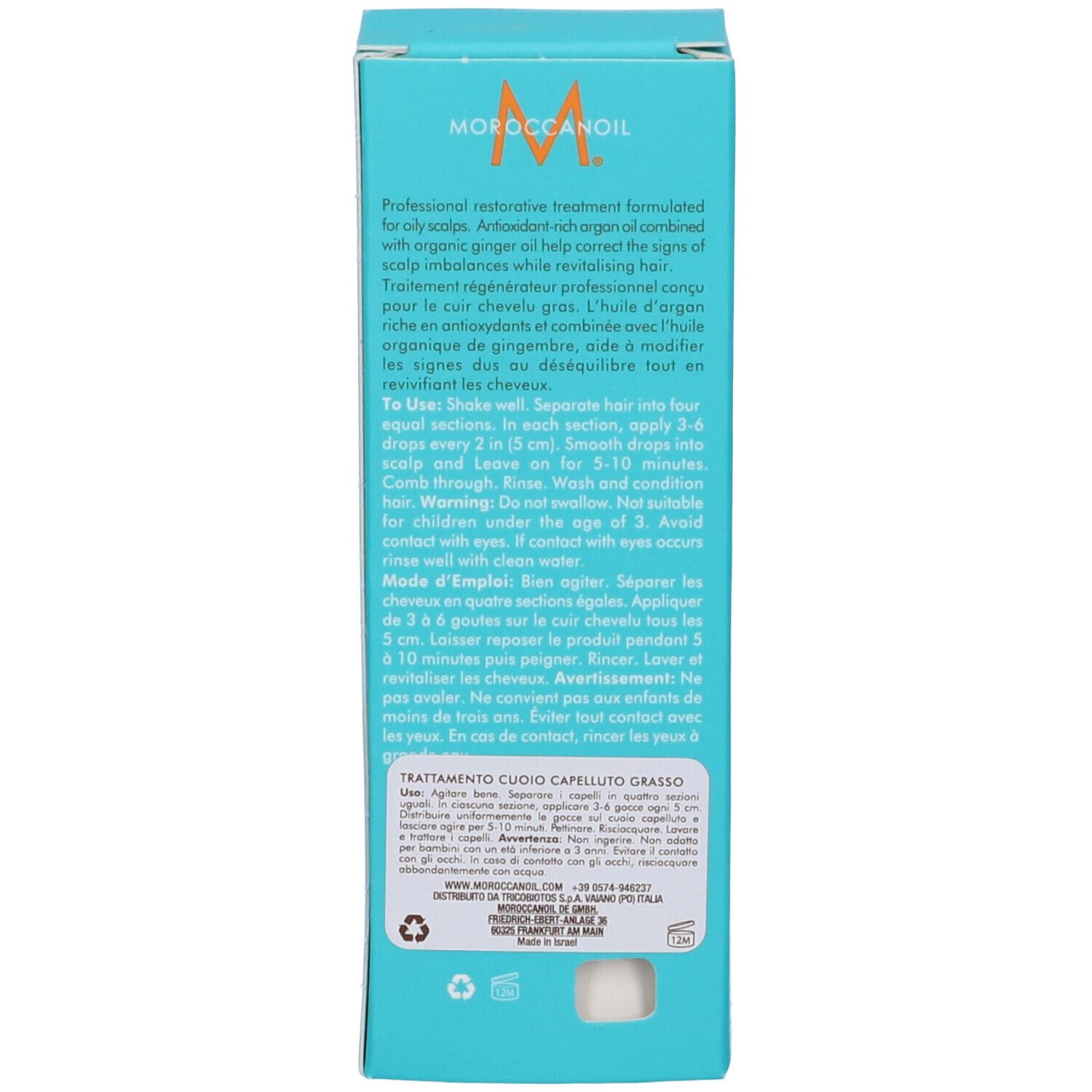 Boîte turquoise avec informations produit en anglais, français et italien. Marque : Moroccanoil.