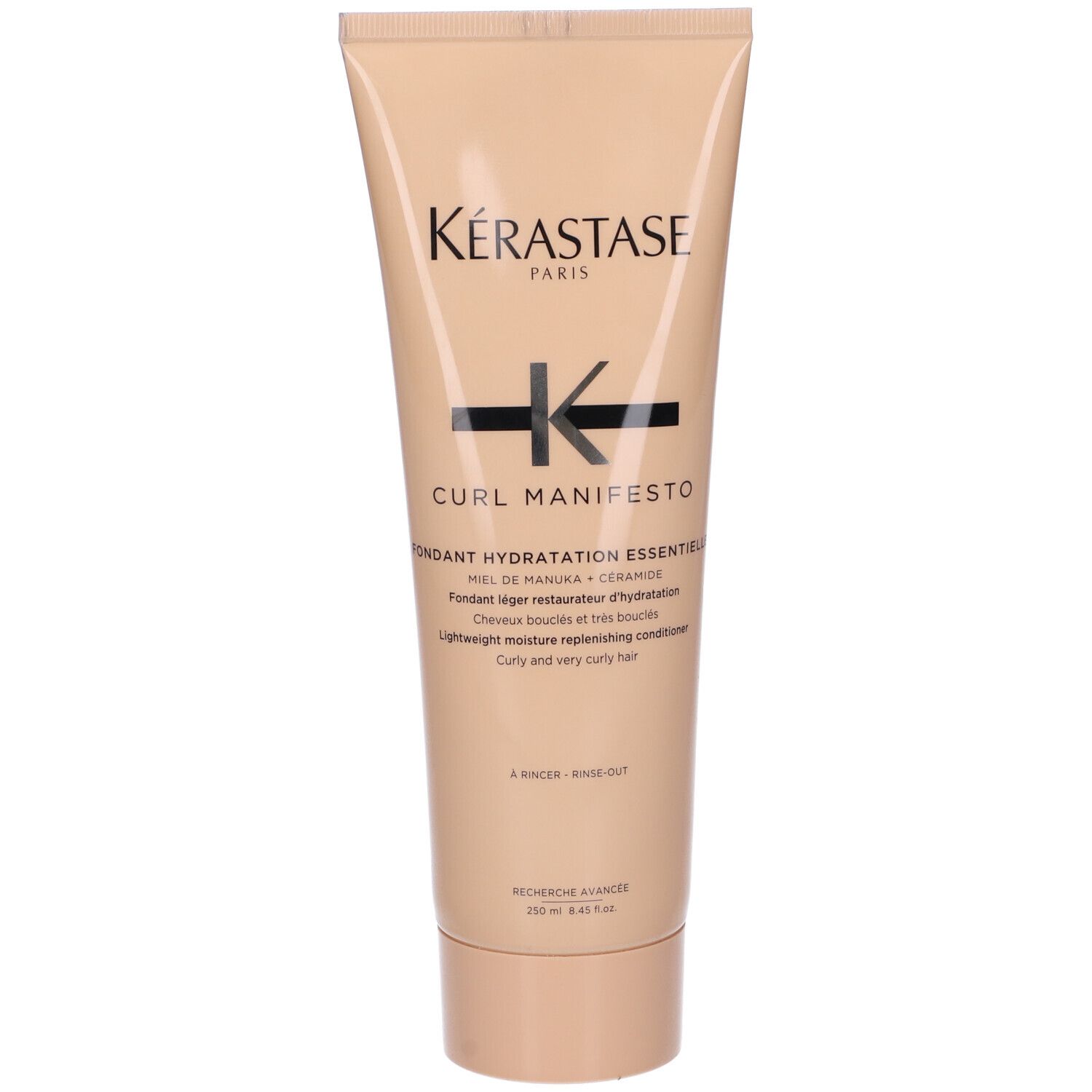 Tube beige Kérastase. Inscription Kérastase Paris et Curl Manifesto. Texte en anglais et français. Contenance 250 ml.