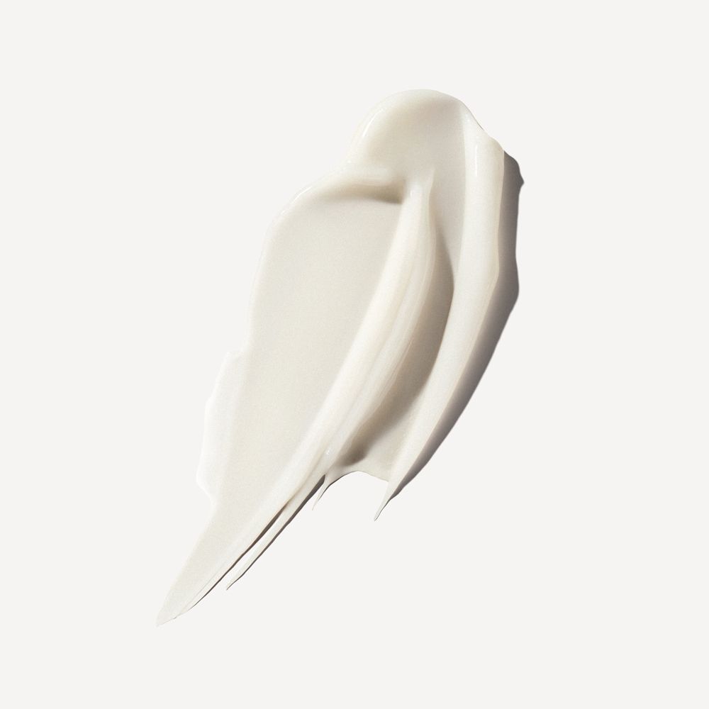 Witte crèmetextuur met gladde, gebogen lijnen op een lichte achtergrond.