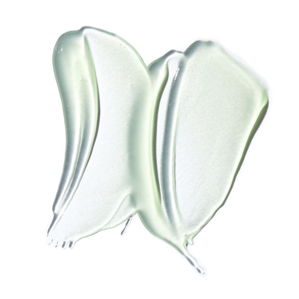 Substance gélifiée, vert clair, sur fond blanc. Deux traits incurvés.