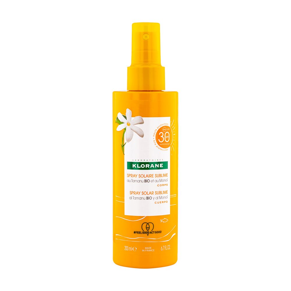 Gele sprayfles met zonnecrème. Opschrift: KLORANE, Spray Solaire Sublime SPF 30. Met Monoi en Tamanu Bio.