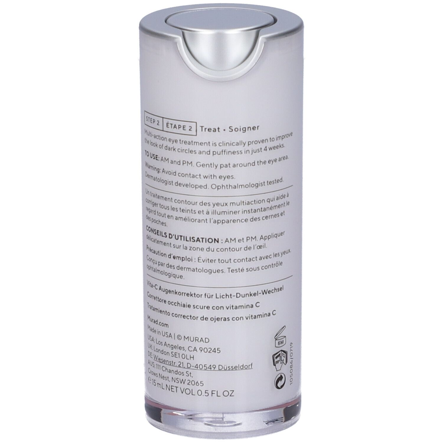 Murad Vita-C Eyes Dark Circle Corrector. Flacon blanc, bouchon argenté, étiquette jaune. Nom du produit et marque visibles.