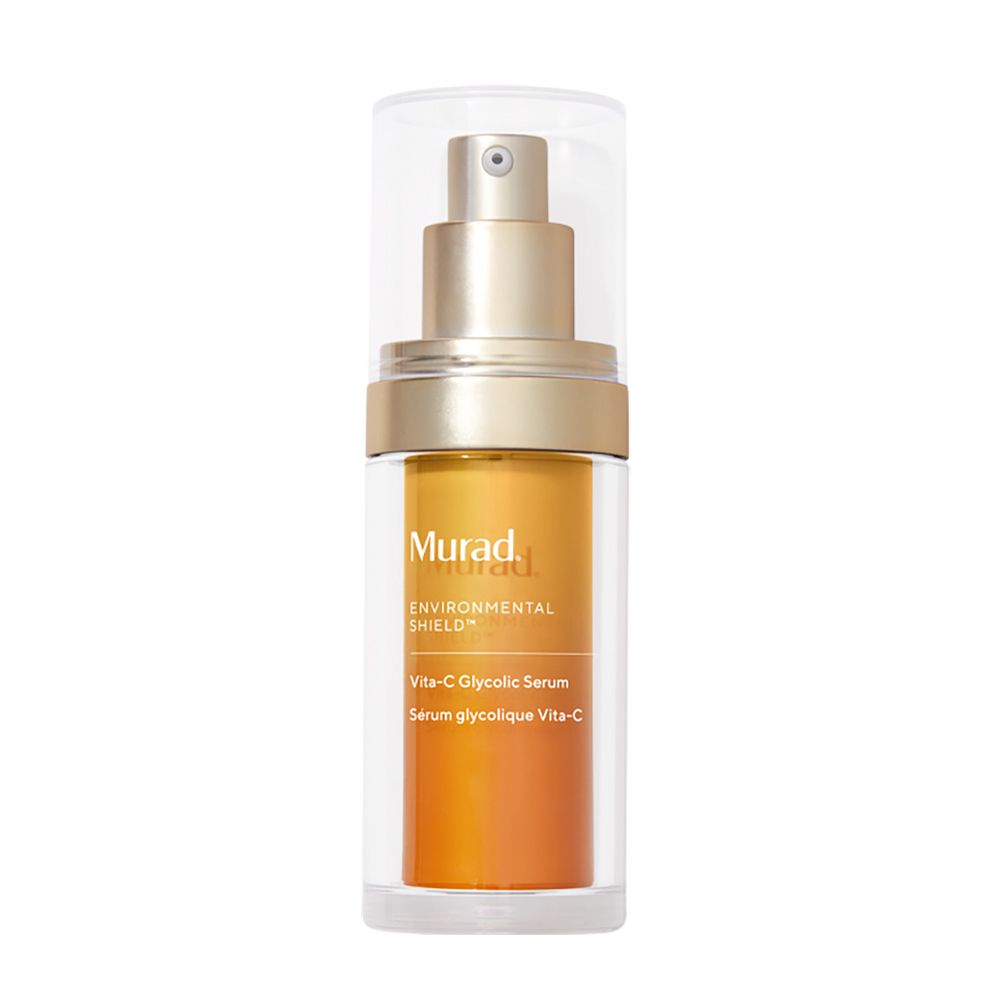 Flacon transparent avec pompe dorée et liquide orange. Inscription: Murad, Vita-C Glycolic Serum.