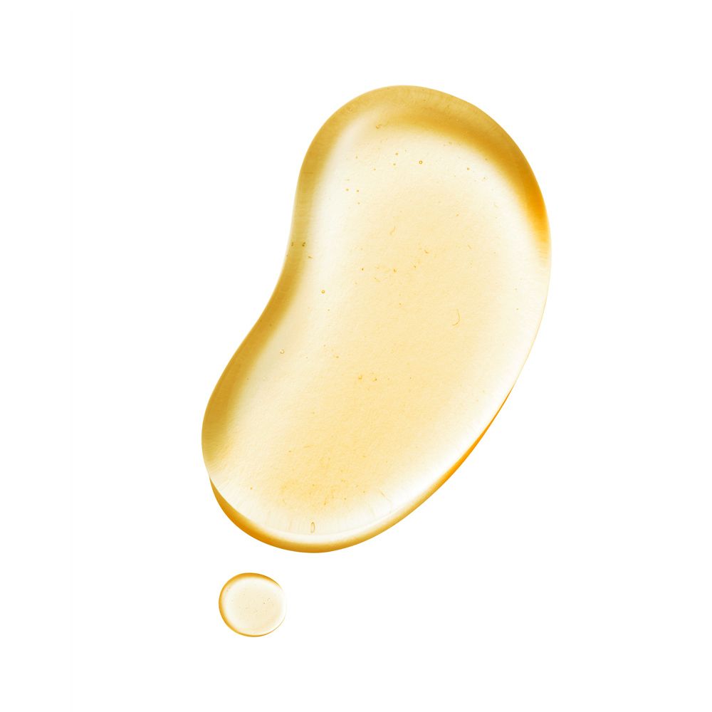 Tache jaune en forme de goutte, avec une petite goutte. Sur fond blanc.