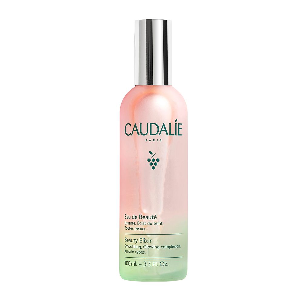 Flacon Caudalie Eau de Beauté. Dégradé vert/rose. Bouchon argenté. Texte: Beauty Elixir.