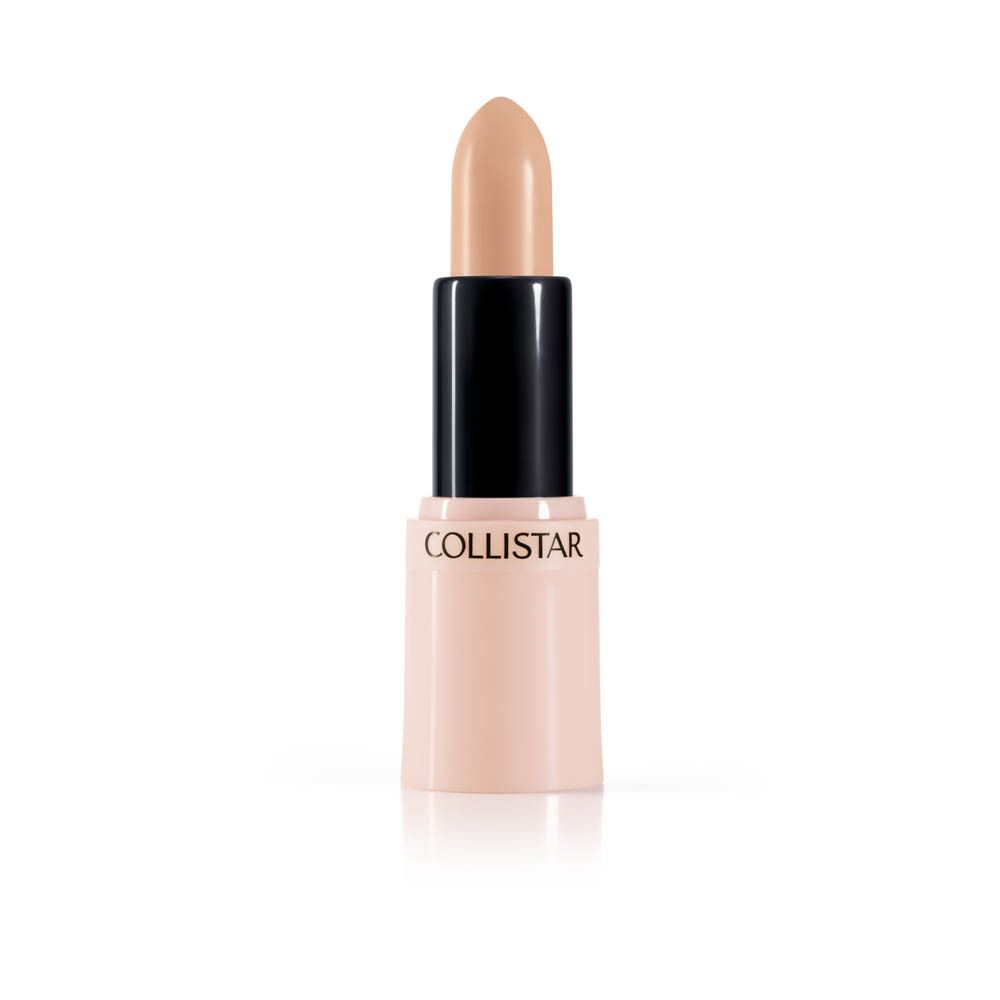Correcteur beige en stick. Tige noire, étui rose. Marque : Collistar.
