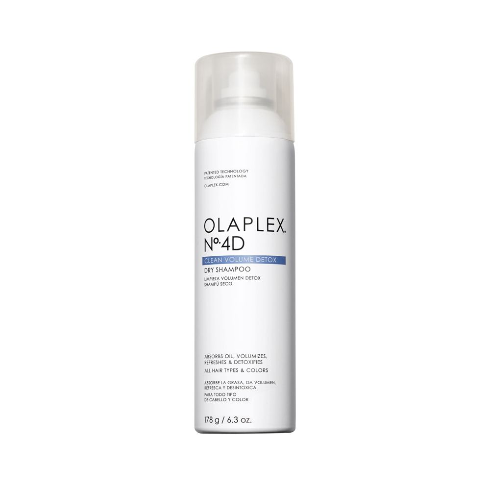 Spray de shampooing sec Olaplex Nº4D blanc avec bouchon transparent. Nom et détails du produit imprimés.