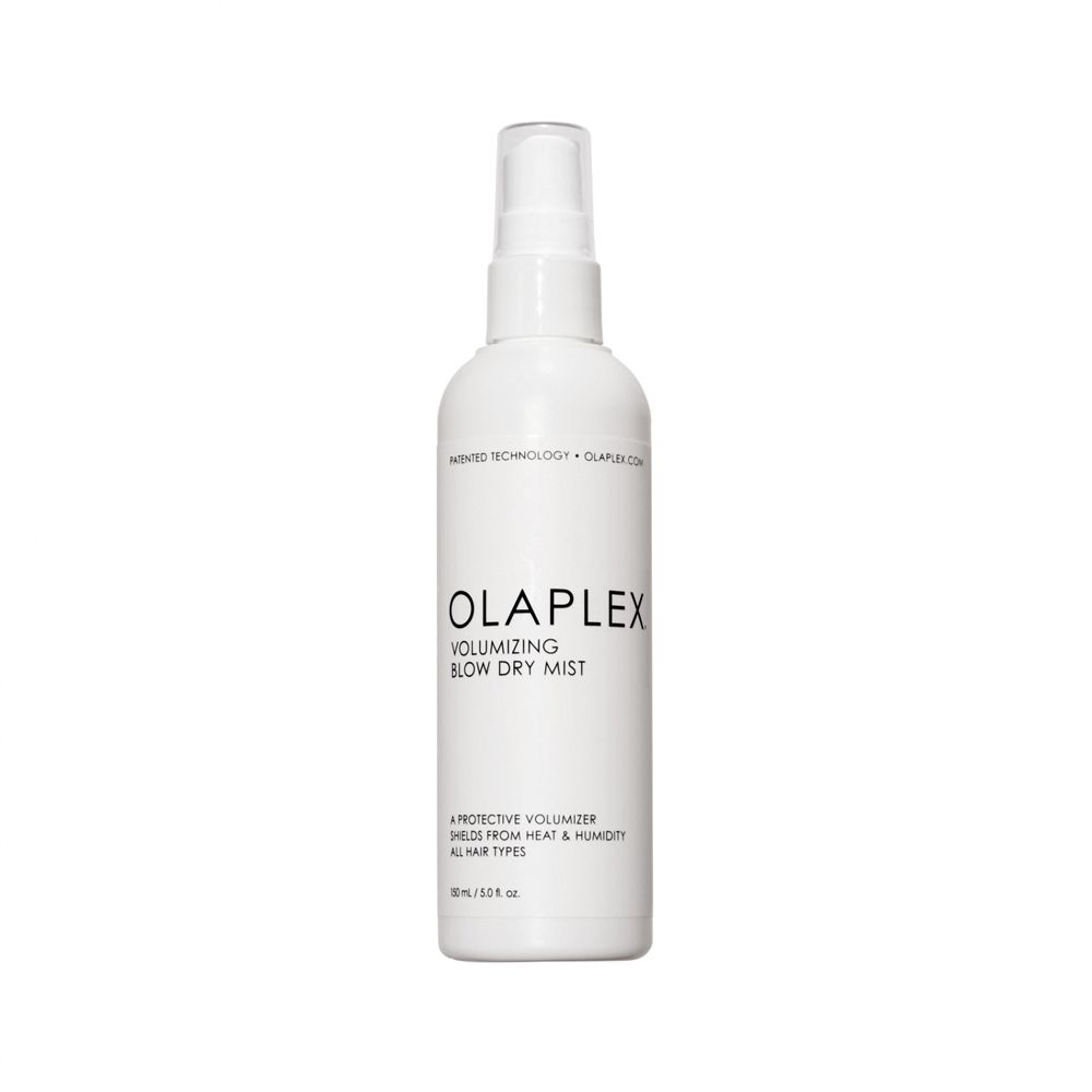 Flacon vaporisateur blanc Olaplex Volumizing Blow Dry Mist. Texte et logo visibles. Contenance 150 ml.