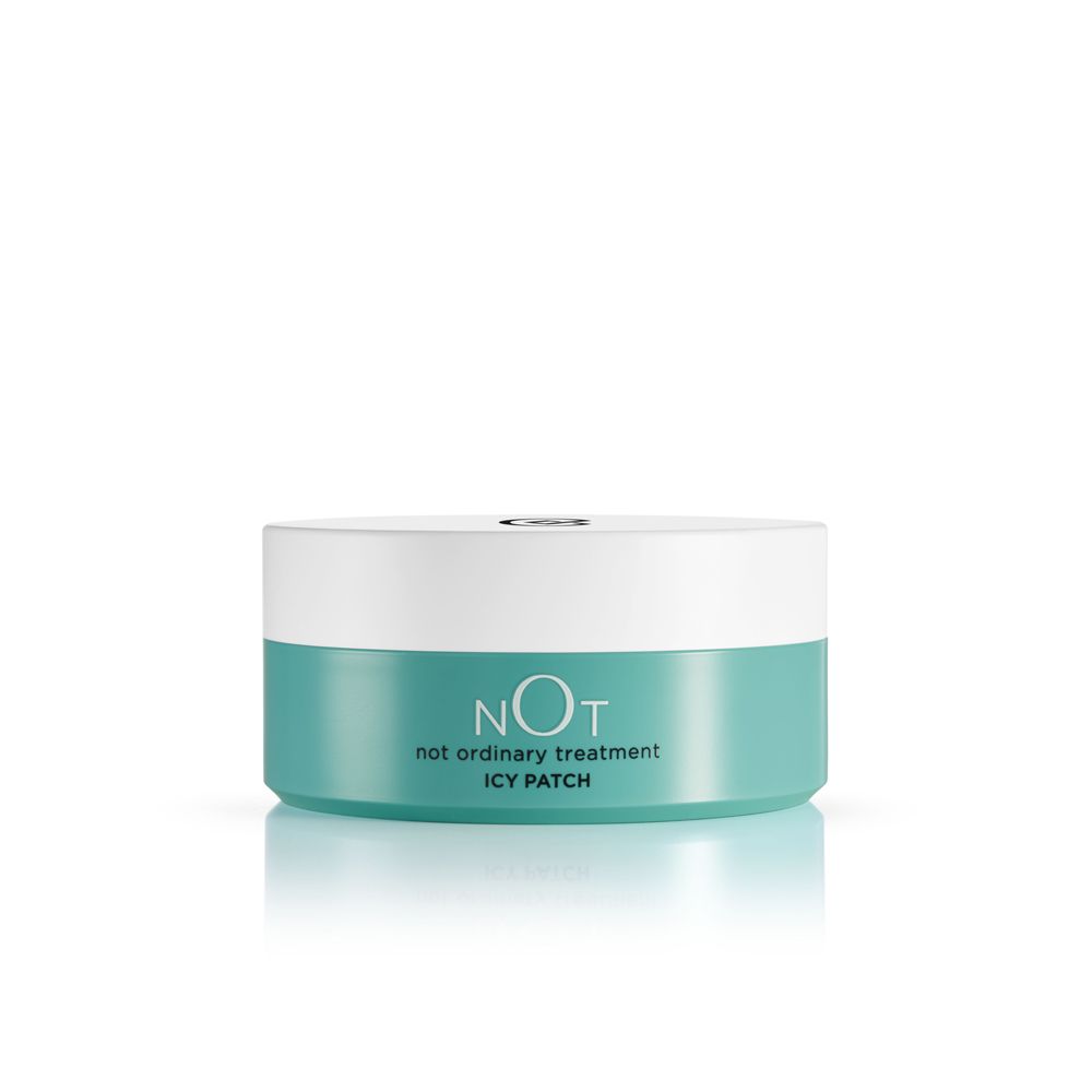 Contenant rond avec couvercle blanc et base turquoise, étiqueté 'NOT icy patch'.