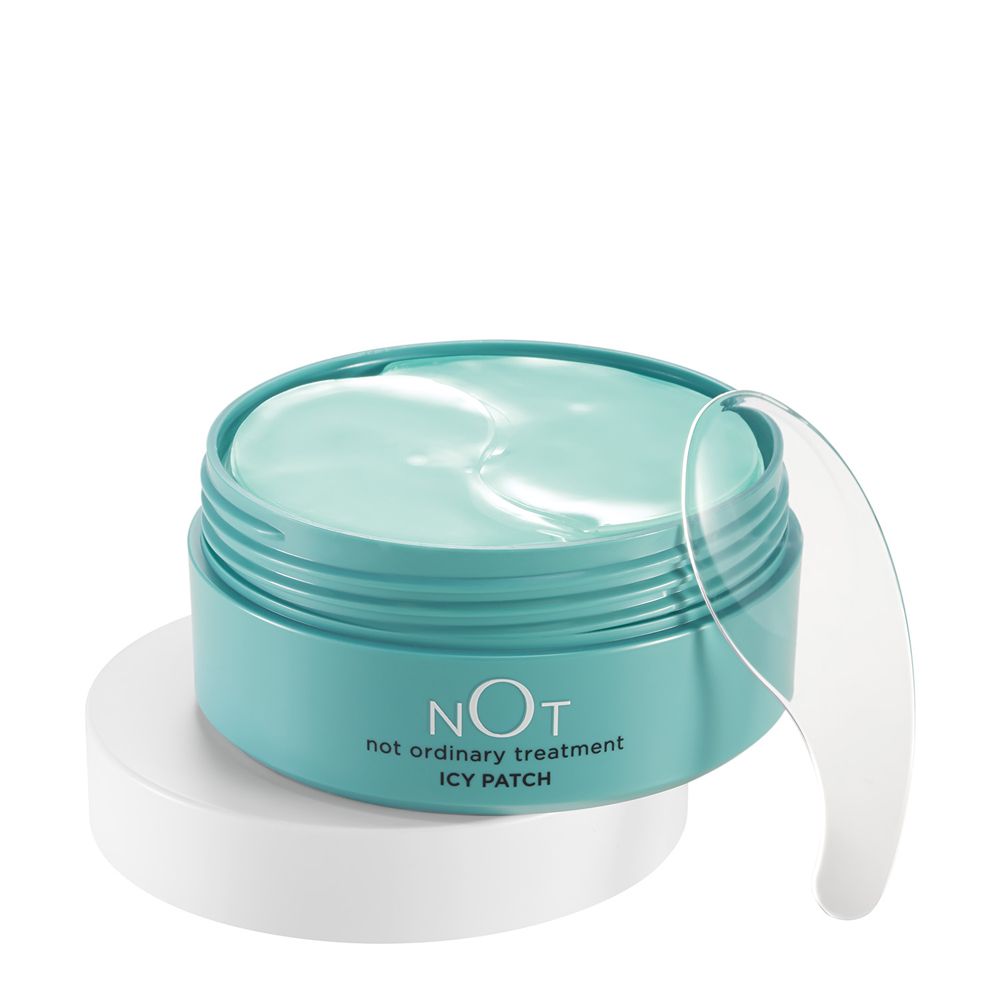 Contenant ouvert avec des patchs hydrogel turquoise et une spatule. Étiquette 'NOT icy patch'.