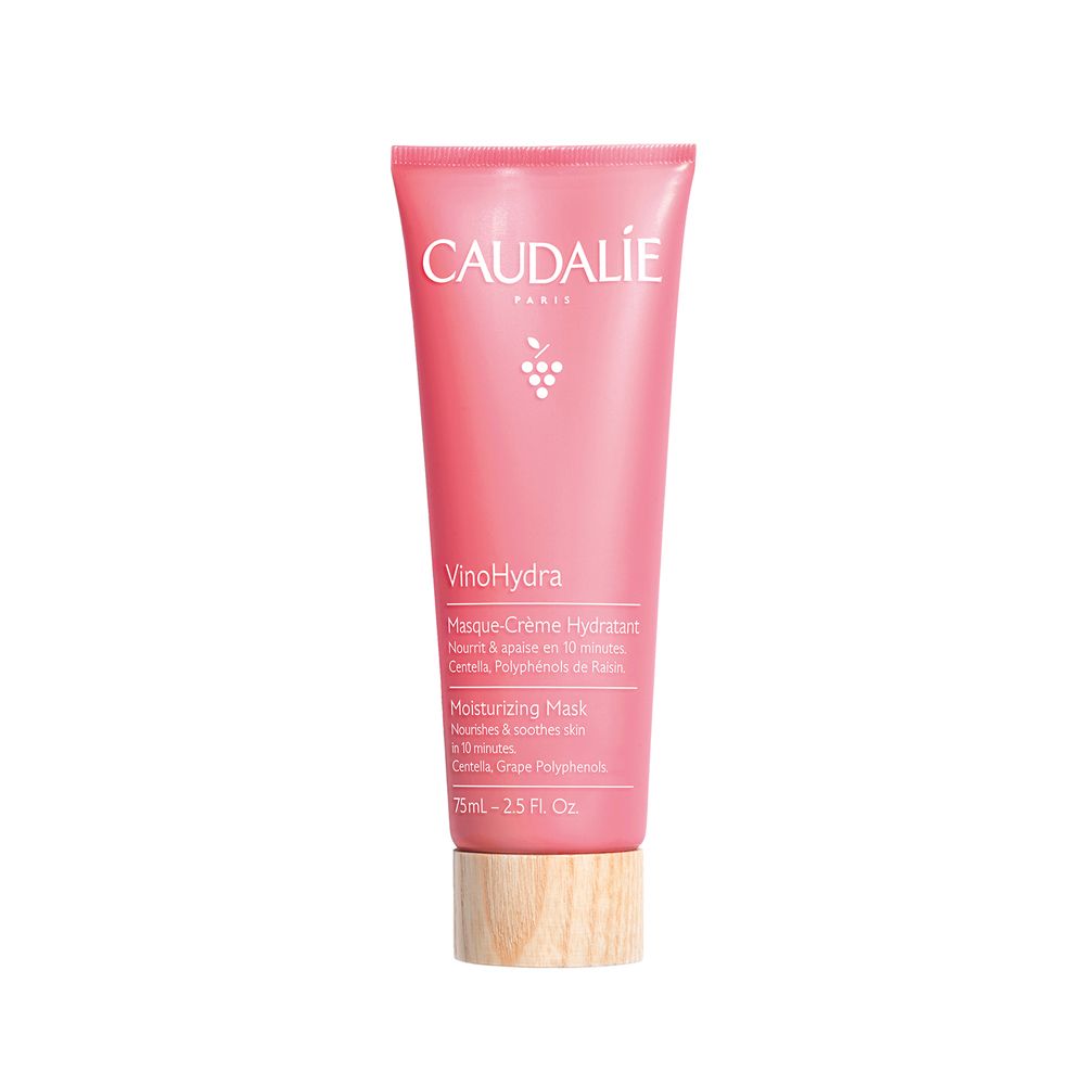 Tube rose Caudalie Vinohydra. Inscription blanche. Bouchon bois clair. Texte: Masque-Crème Hydratant, 75ml.