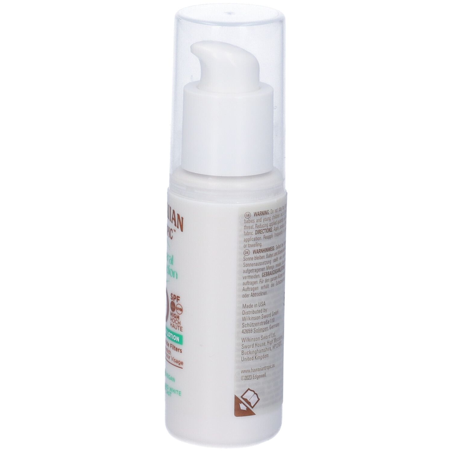 Flacon blanc avec pompe. Inscriptions: Hawaiian Tropic, Mineral Protection, 30 SPF, Facial Milk Lotion. Vegan.