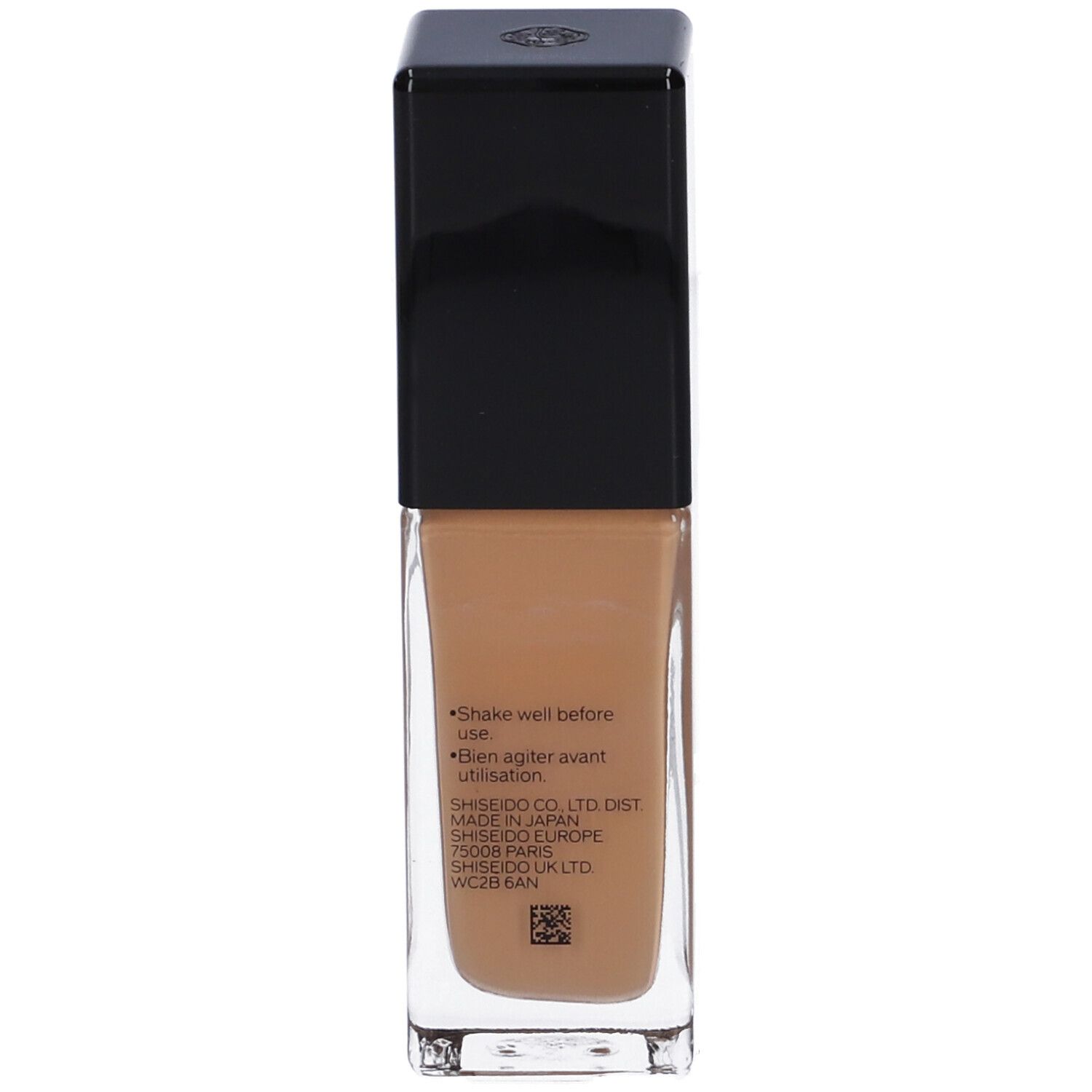 Dos du flacon de fond de teint. Texte : Shake well before use. SHISEIDO CO. LTD DIST. MADE IN JAPAN.