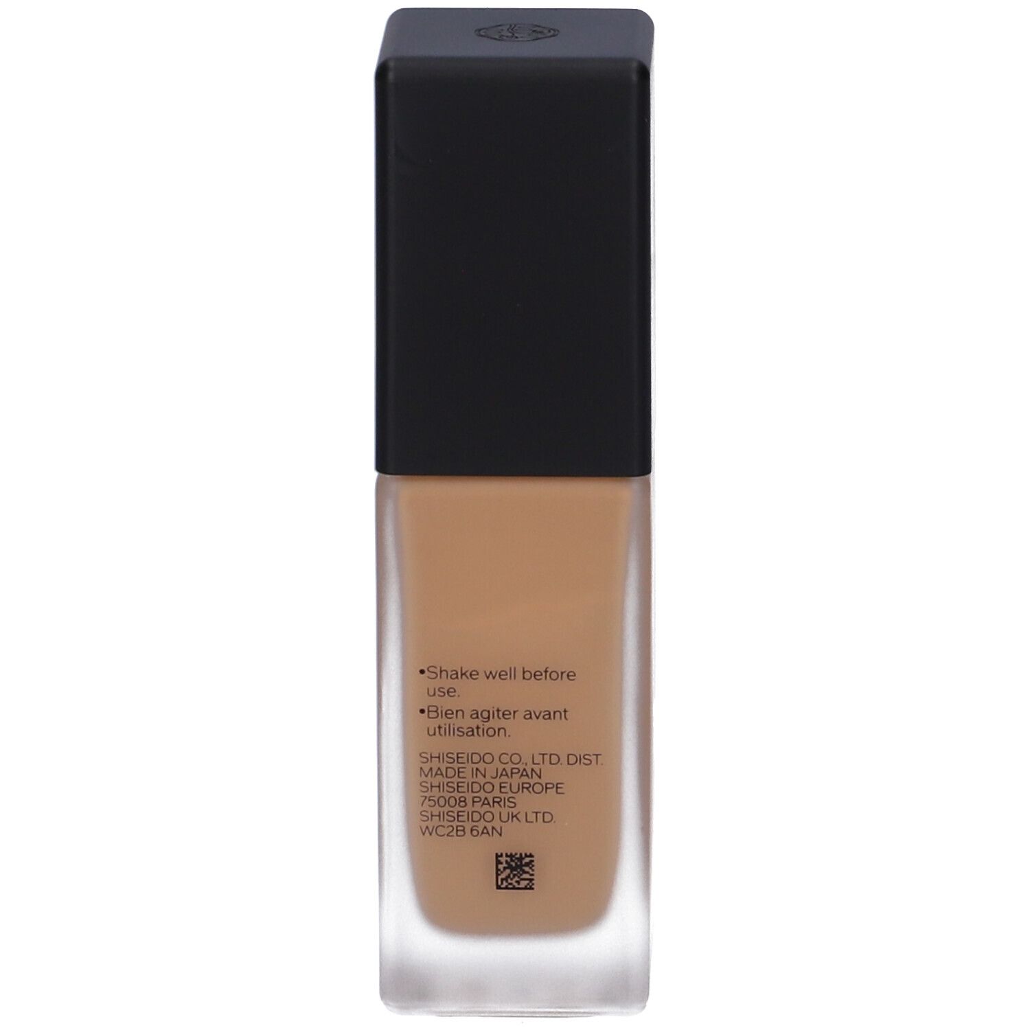 Dos du flacon Shiseido Synchro Skin Foundation. Texte: Shake well before use. Informations de fabrication et de distribution.