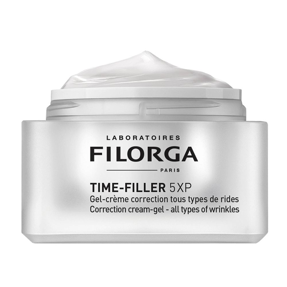 Pot de crème-gel. Pot blanc avec couvercle argenté. Crème sur le couvercle. Texte noir : FILORGA, TIME-FILLER 5XP.