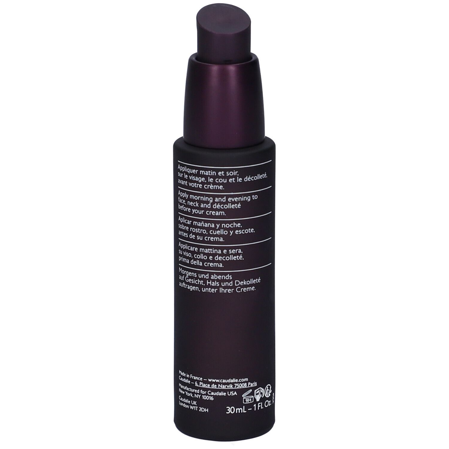 Flacon violet foncé avec pompe. Texte au dos. Caudalie Premier Cru Le Sérum.