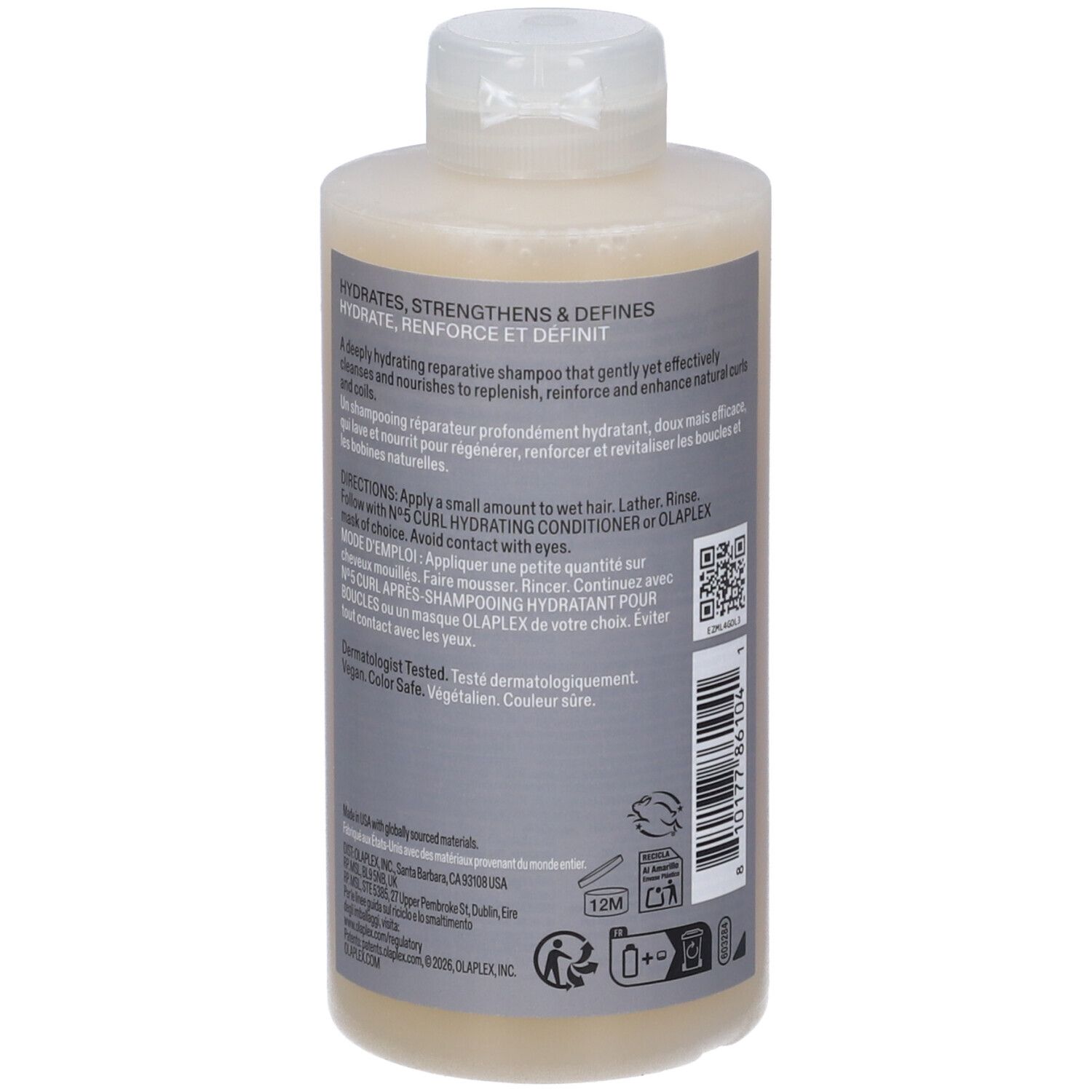 Bouteille de shampooing réparateur qui hydrate, fortifie et définit. Contient des instructions et des ingrédients.