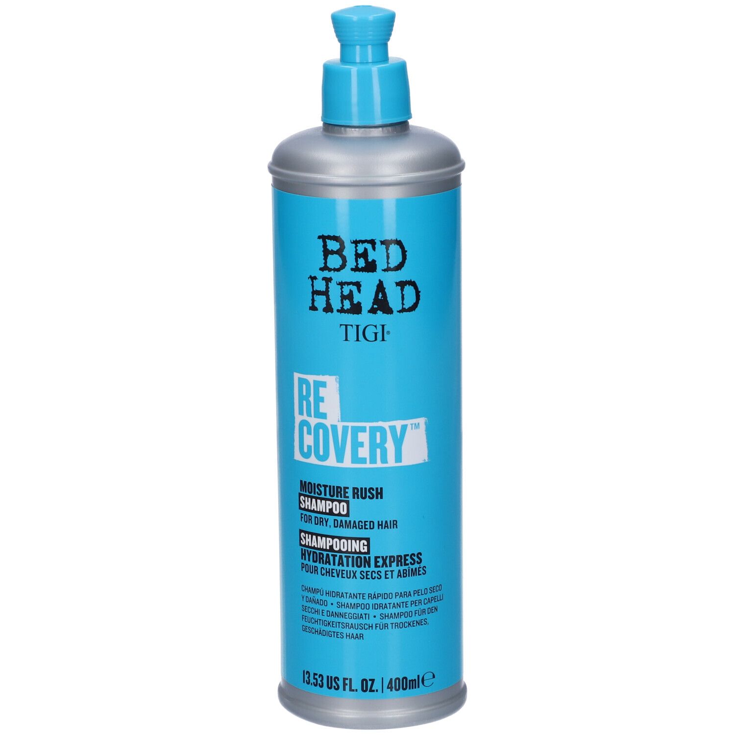 Bouteille bleue avec tête de pulvérisation argentée, shampooing "Bed Head Tigi Recovery".